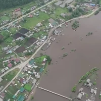 Вода медленно отступает от подтопленных домов в Казачинско-Ленском районе