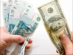 К середине 2015 года доллар будет стоить 100 рублей