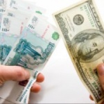 К середине 2015 года доллар будет стоить 100 рублей